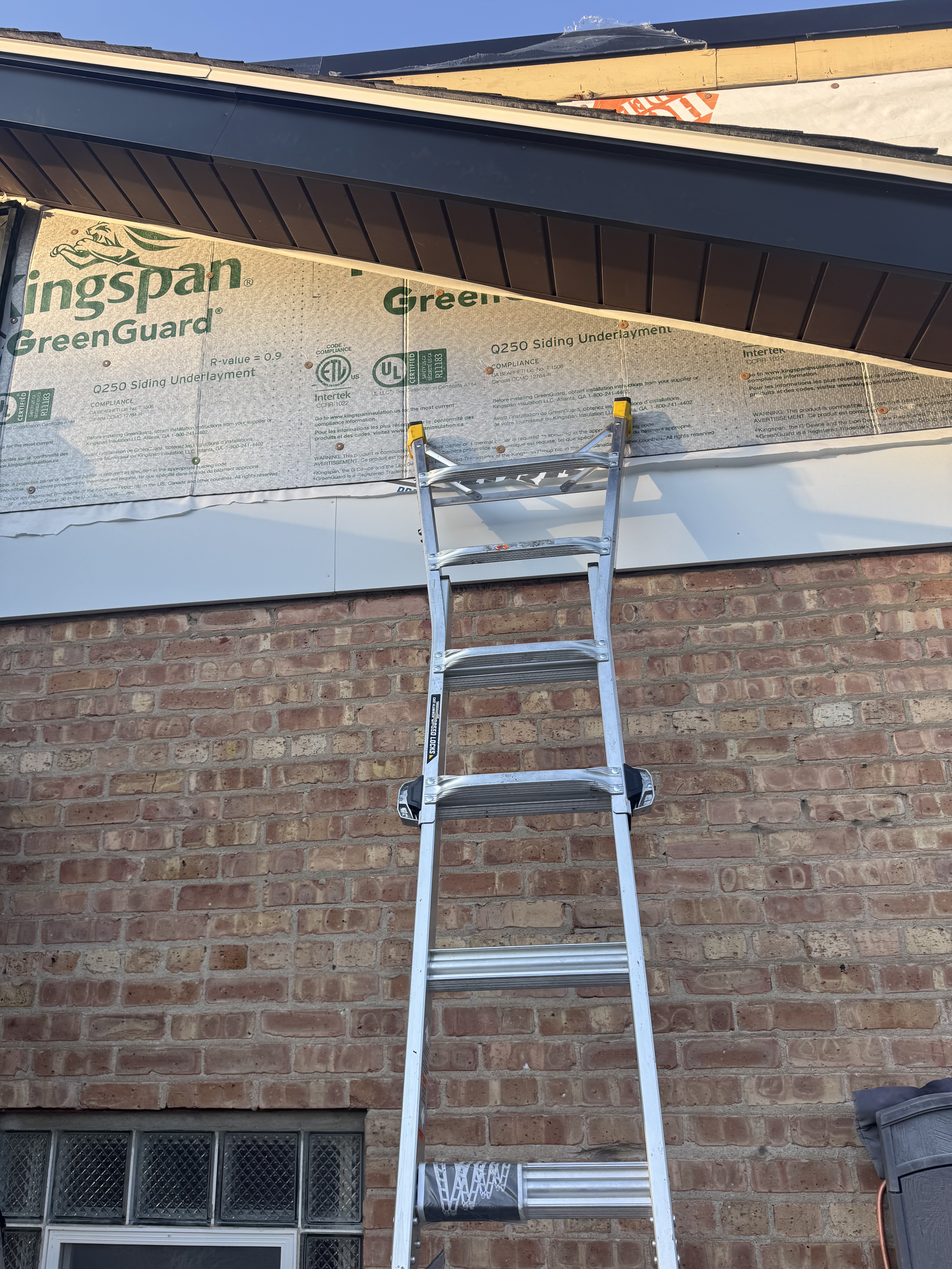 JV Roofing team performing siding installation for Southwest Suburbs of Chicago homeowners - top-rated roofing service